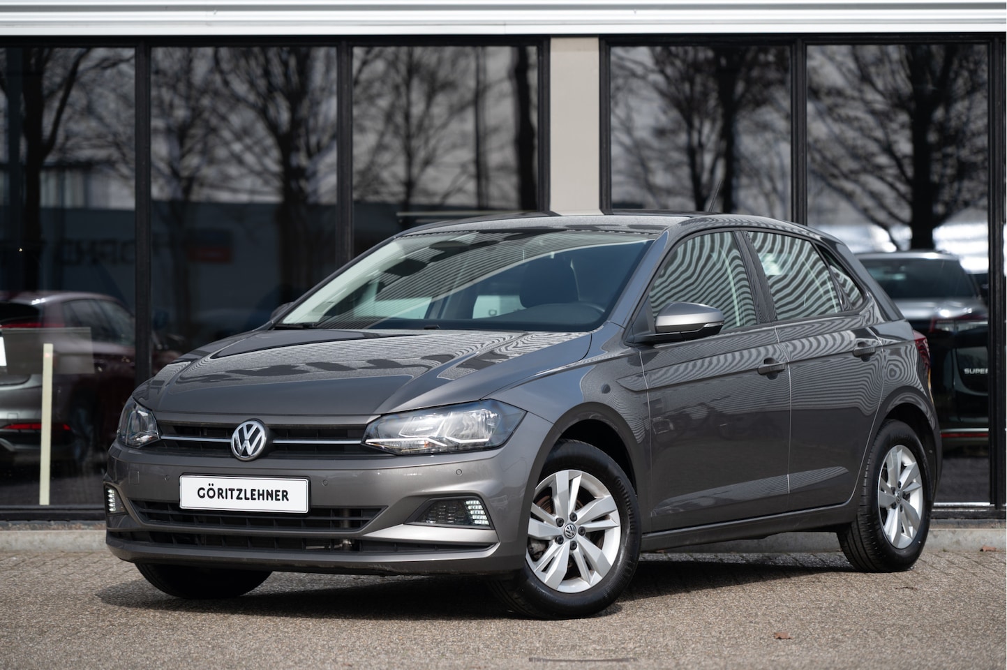 Volkswagen Polo - 1.0 TSI DSG Comfortline | PDC V+A | LMV | Airco | - AutoWereld.nl