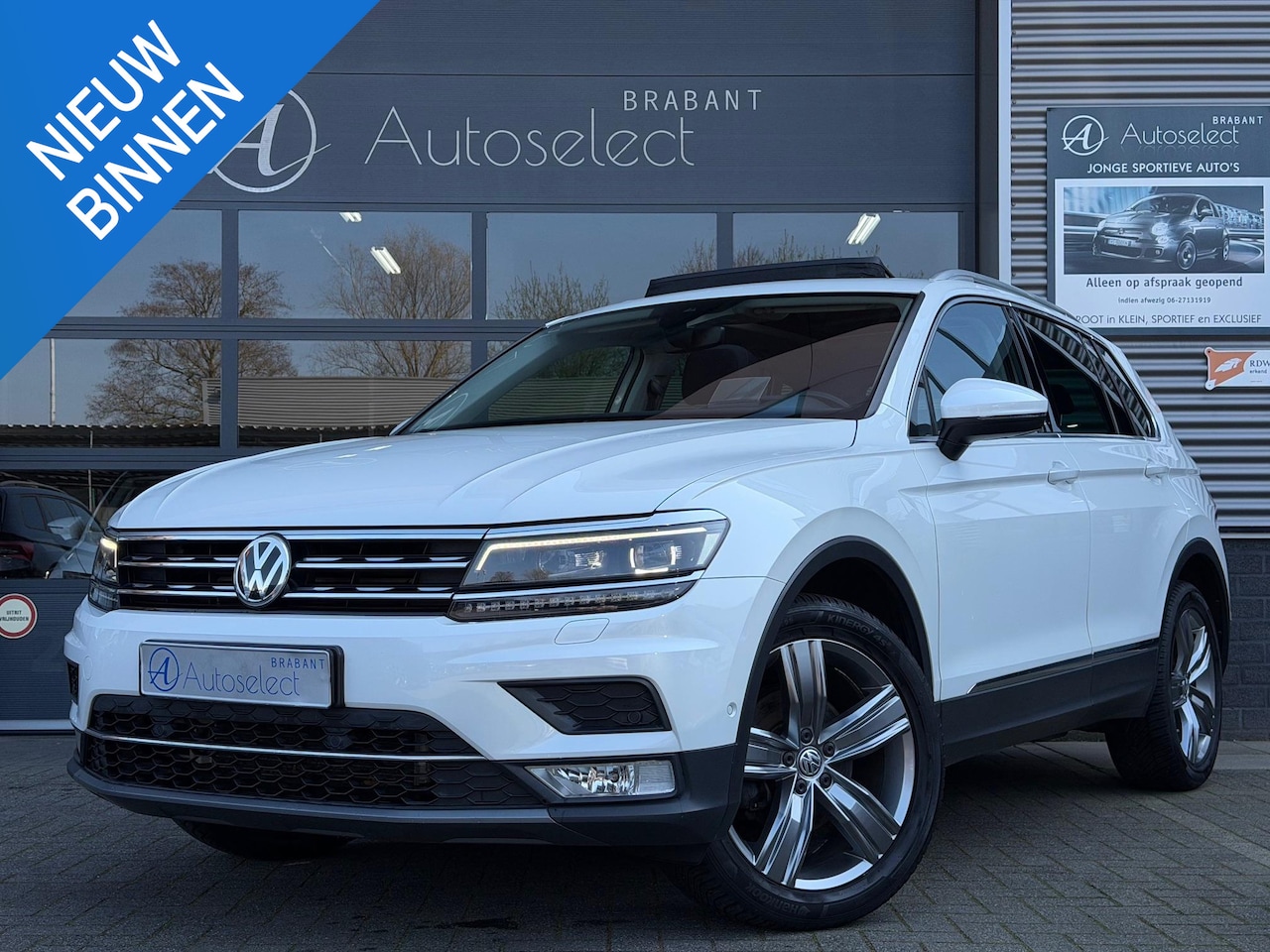 Volkswagen Tiguan - 1.4 TSI 4Motion Highline Pano HUD LED - AutoWereld.nl