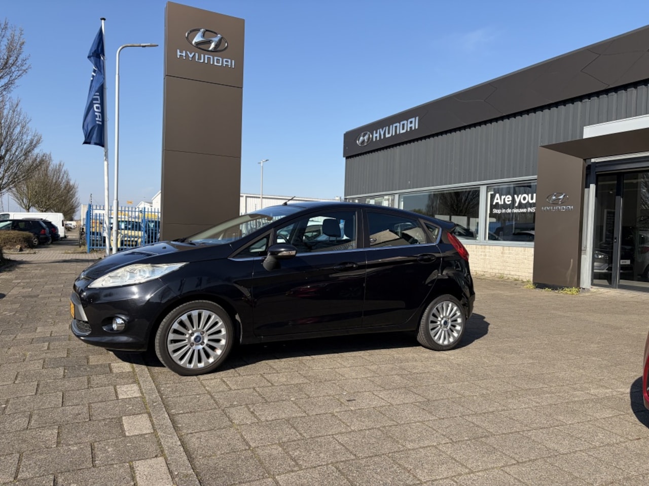 Ford Fiesta - 1.6 Ghia 1.6 Ghia - AutoWereld.nl