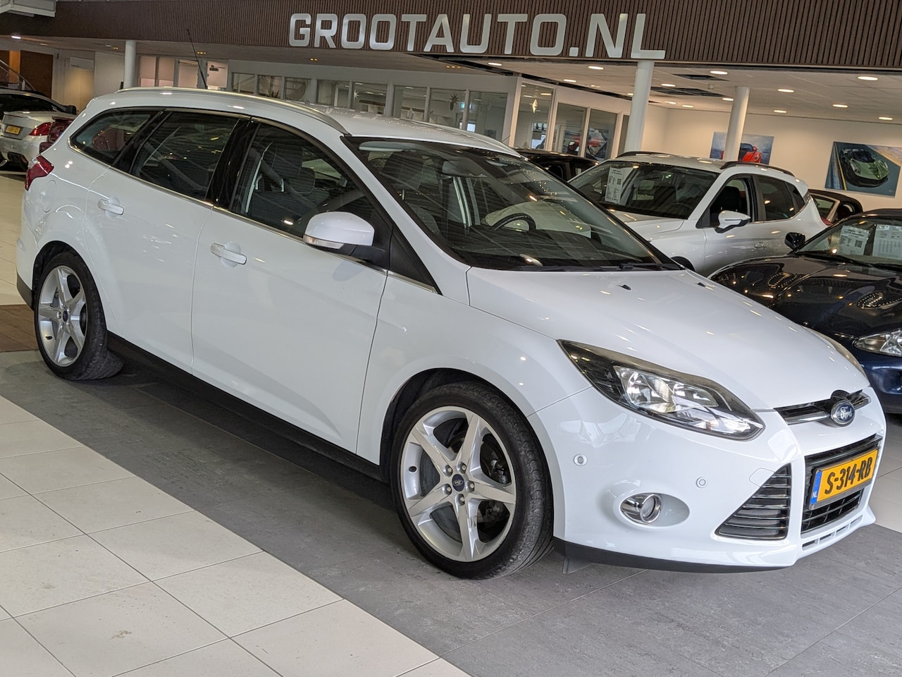 Ford Focus Wagon - 1.0 EcoBoost Trend Airco, Cruise Control, Trekhaak, Stuurbekrachtiging - AutoWereld.nl