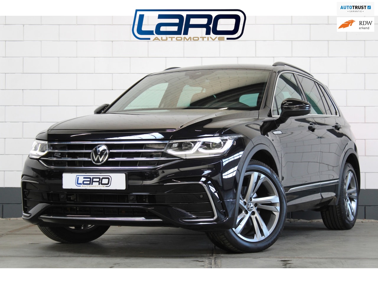 Volkswagen Tiguan - 1.5 TSI R-Line | IQ.Lights Keyless HuD Camera CarPlay Elek koffer - AutoWereld.nl