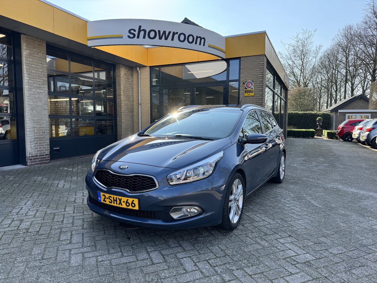 Kia Cee'd Sportswagon - 1.6 GDI Business Pack Climate Control Navi - AutoWereld.nl