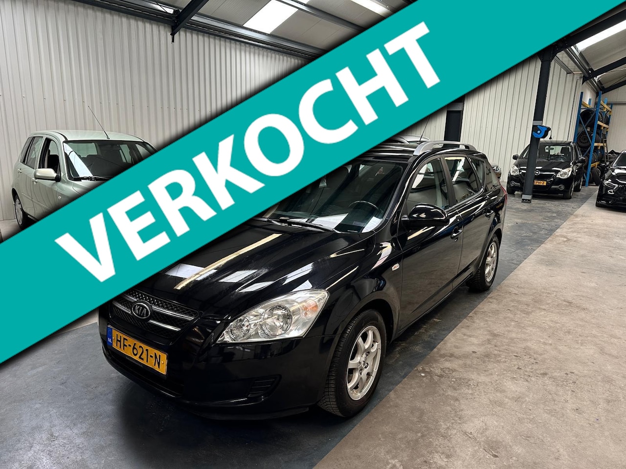 Kia Cee'd Sporty Wagon - 1.4 Fifteen ISG 1.4 Fifteen ISG - AutoWereld.nl