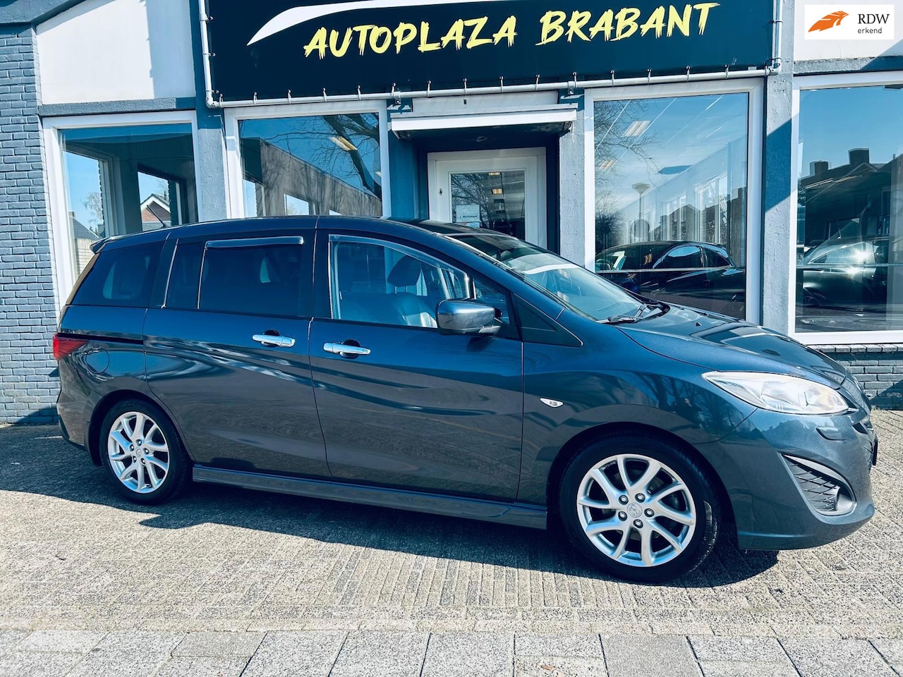 Mazda 5 - 2.0 GT-M/ 7 ZITTER/ CRUISE/ NAVI/ LEER/ STOELVERW/ PDC/ 17 INCH/ 150PK - AutoWereld.nl