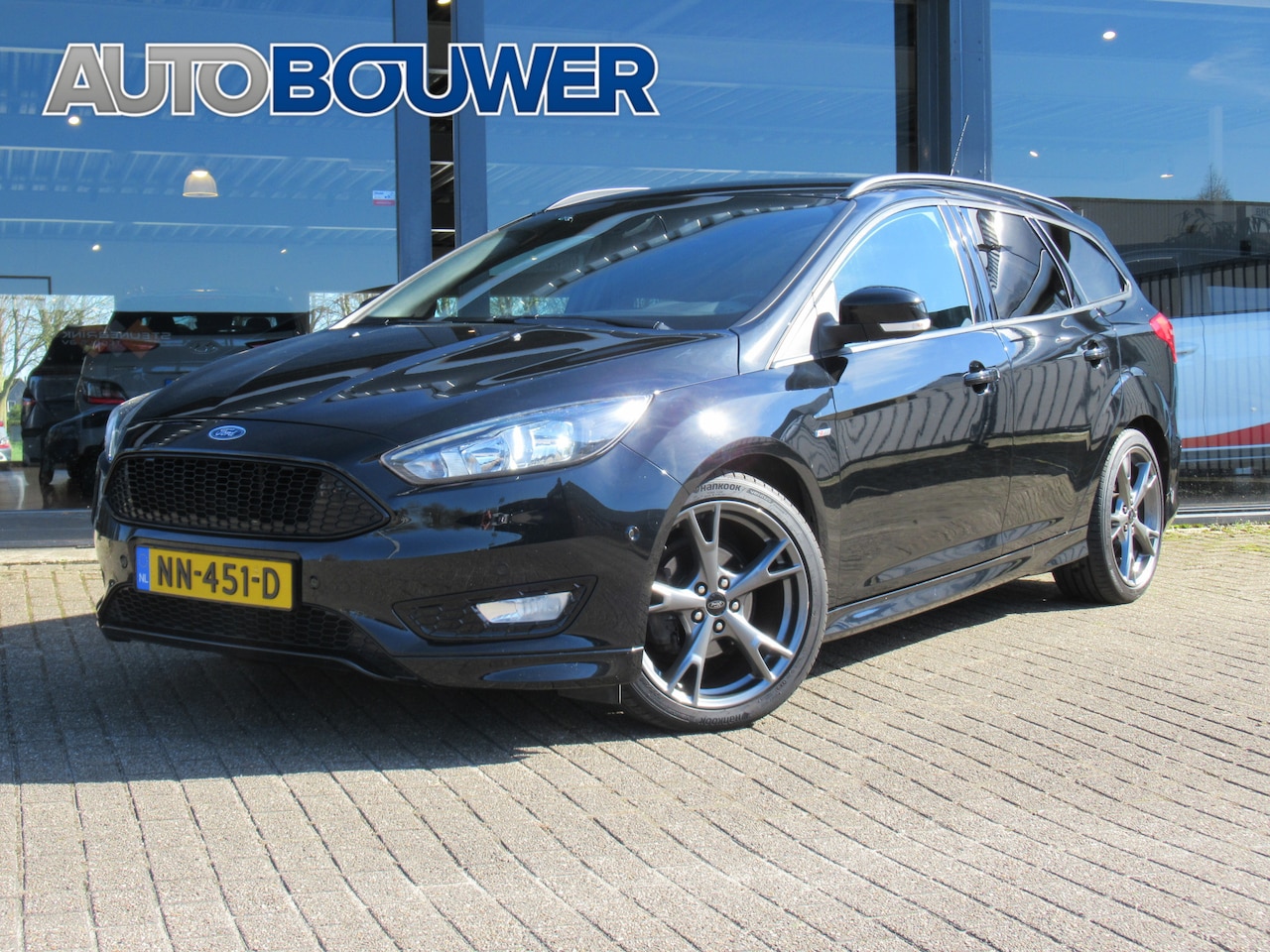 Ford Focus Wagon - 1.0 125 pk ST-Line ! Navi | camera | cruise | 18"inch | tr.haak afneembaar - AutoWereld.nl