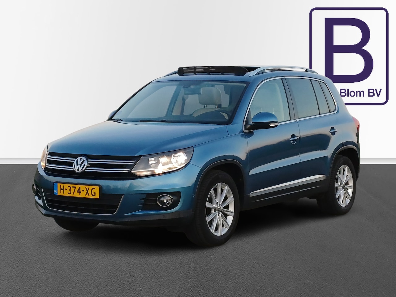 Volkswagen Tiguan - 1.4 TSI Business Edition /Pano/Leder/Navi/Cruise/Trekh./ - AutoWereld.nl