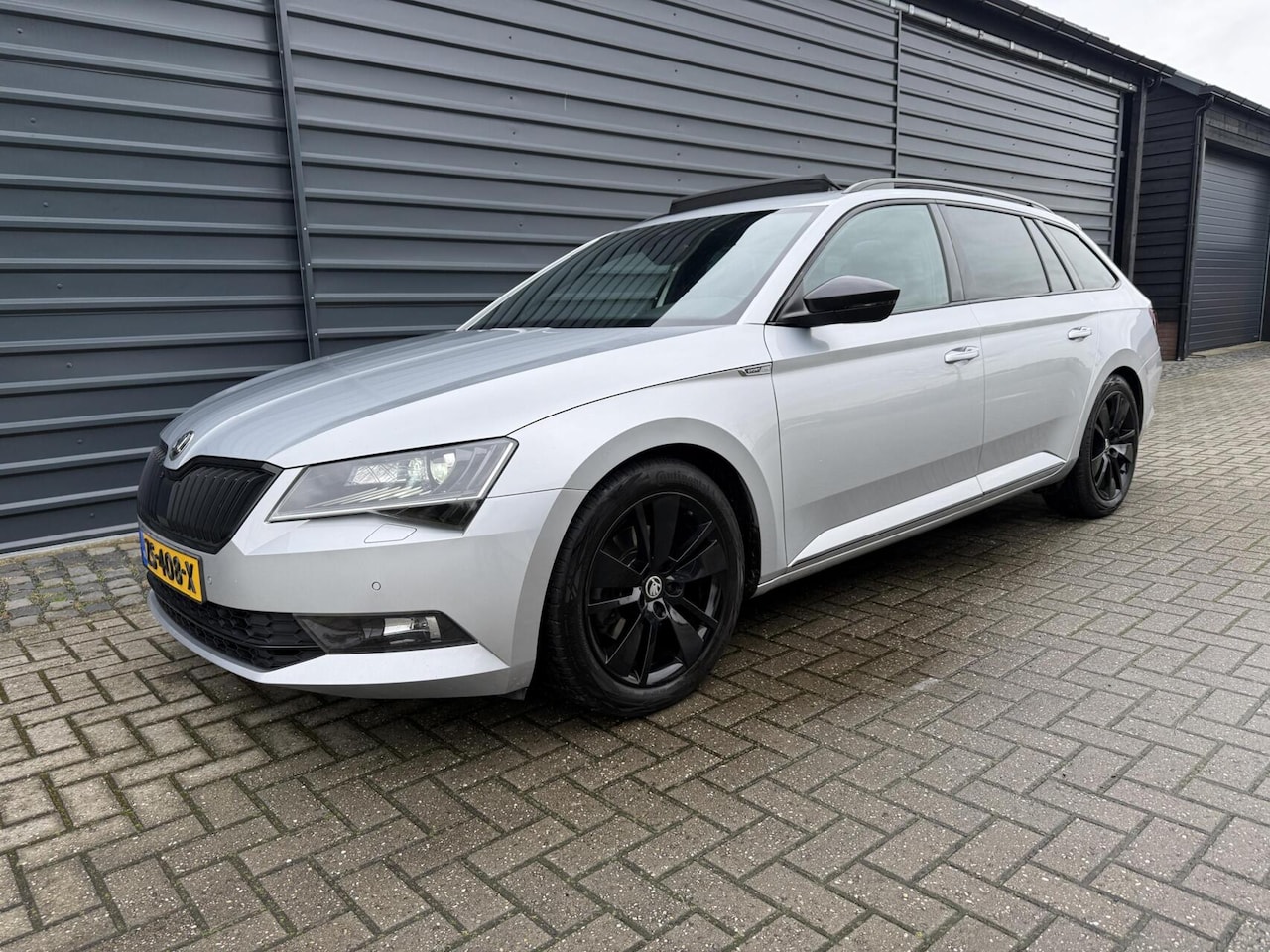 Skoda Superb Combi - 1.5 TSI ACT Sportline Business Panoramadak Navi. - AutoWereld.nl