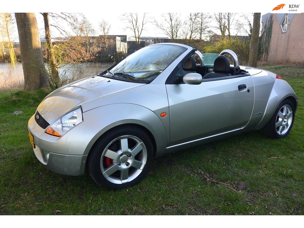 Ford Streetka - 1.6 First Edition cabriolet / airco / leer / windscherm - AutoWereld.nl