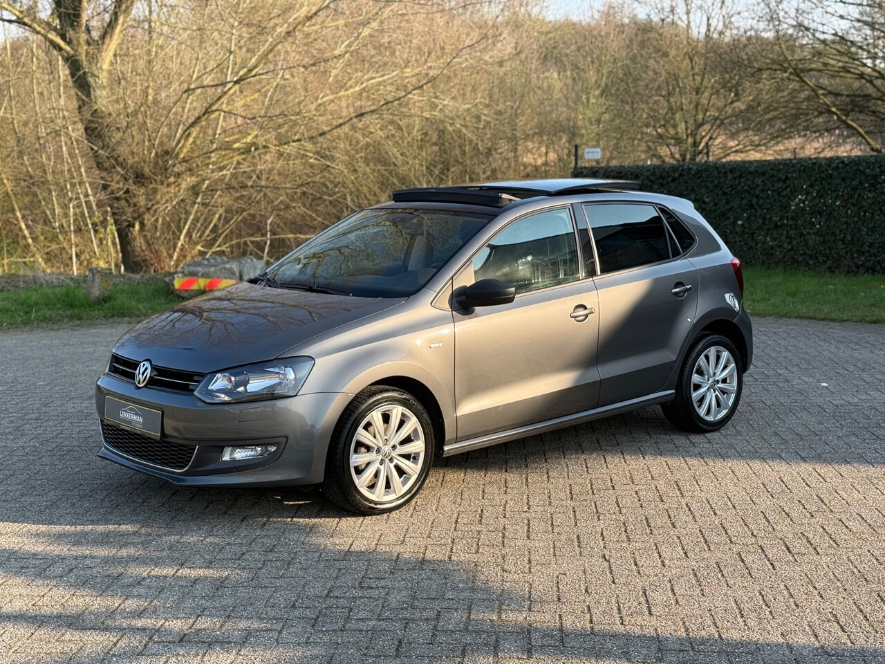 Volkswagen Polo - 1.2 TSI Highline PANO I PDC I CRUISE I 90PK I WEINIG KM - AutoWereld.nl