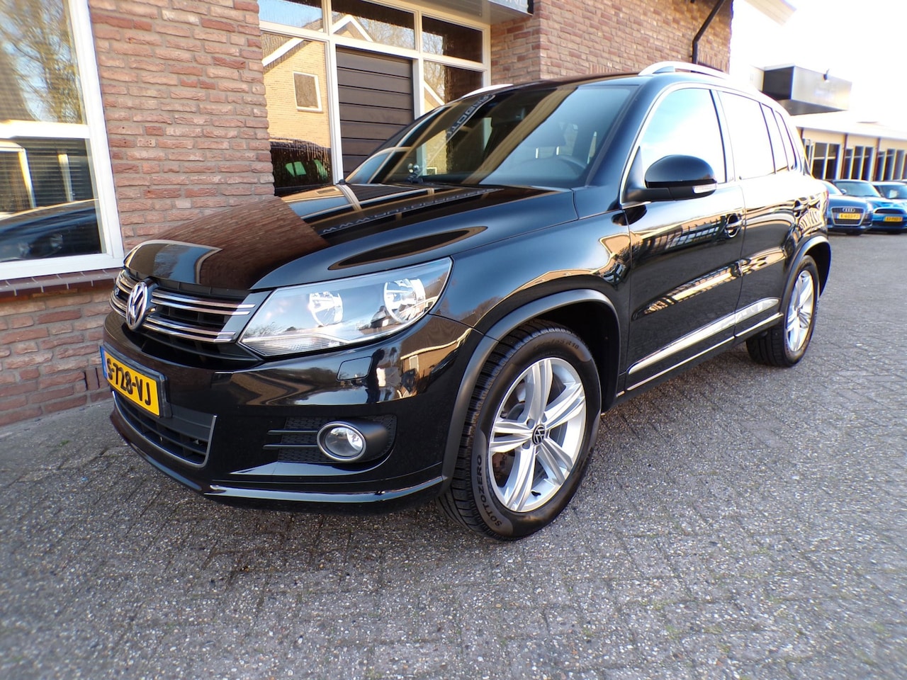 Volkswagen Tiguan - 1.4 TSI Sport&Style 4motion R-line Edition - AutoWereld.nl