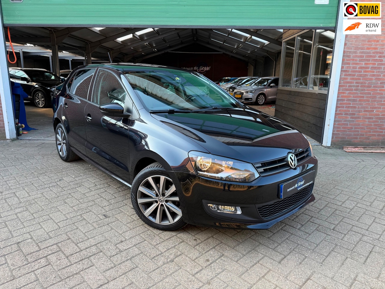 Volkswagen Polo - 1.2 Comfortline|CRUISE/PDC/NAVI/CLIMA - AutoWereld.nl