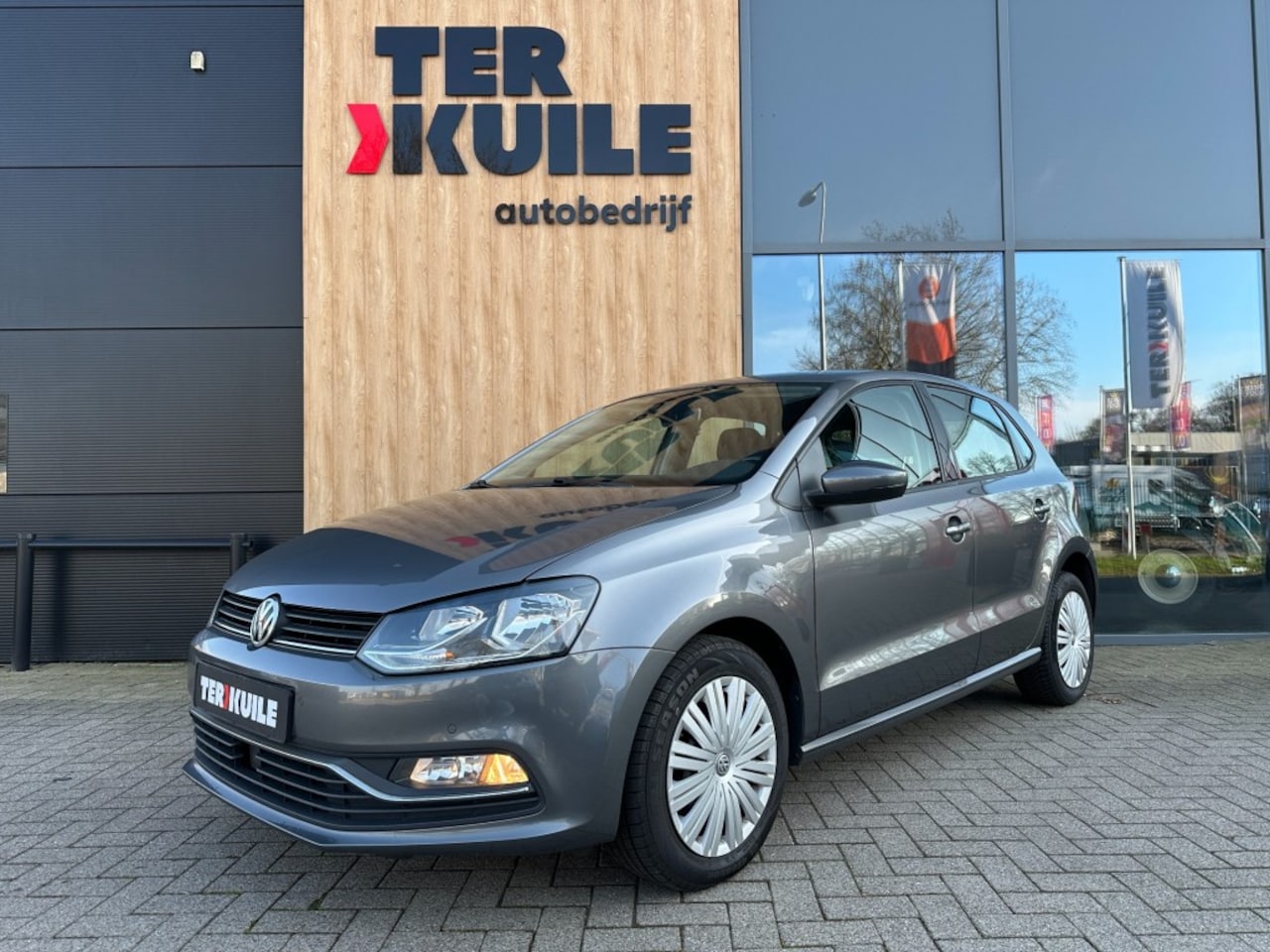 Volkswagen Polo - 1.2 TSI Highline / Automaat / Navigatie - AutoWereld.nl