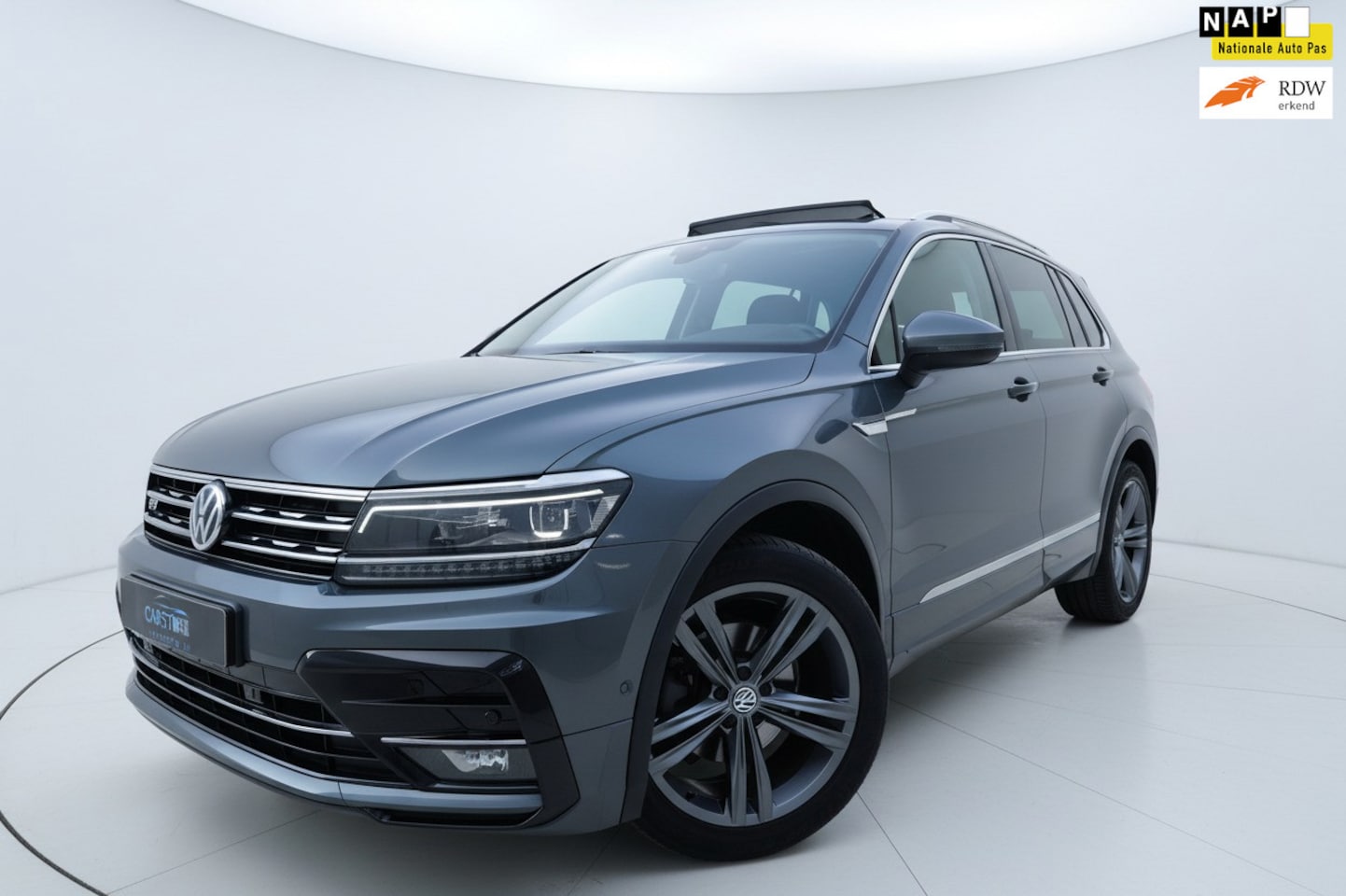 Volkswagen Tiguan - 1.4 TSI ACT R LINE PANO VIRTUAL CAM ACC - AutoWereld.nl