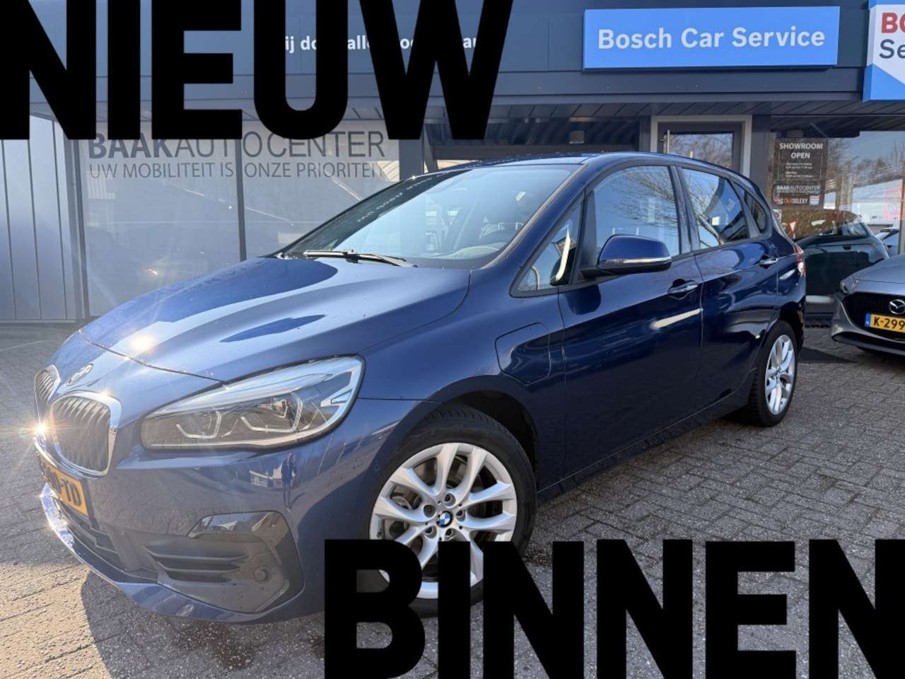 BMW 2-serie Active Tourer - 225xe iPerformance Executive | Leer | Navi | Camera - AutoWereld.nl