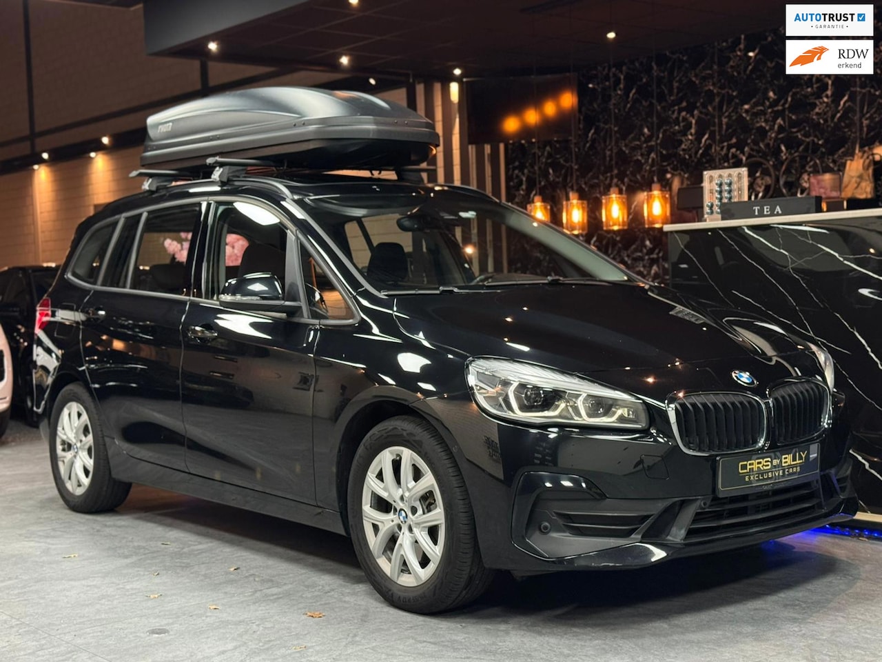 BMW 2-serie Gran Tourer - 220i 7p. High Executive|CRUISE|AUTO|PANO|DAKKOFFER - AutoWereld.nl