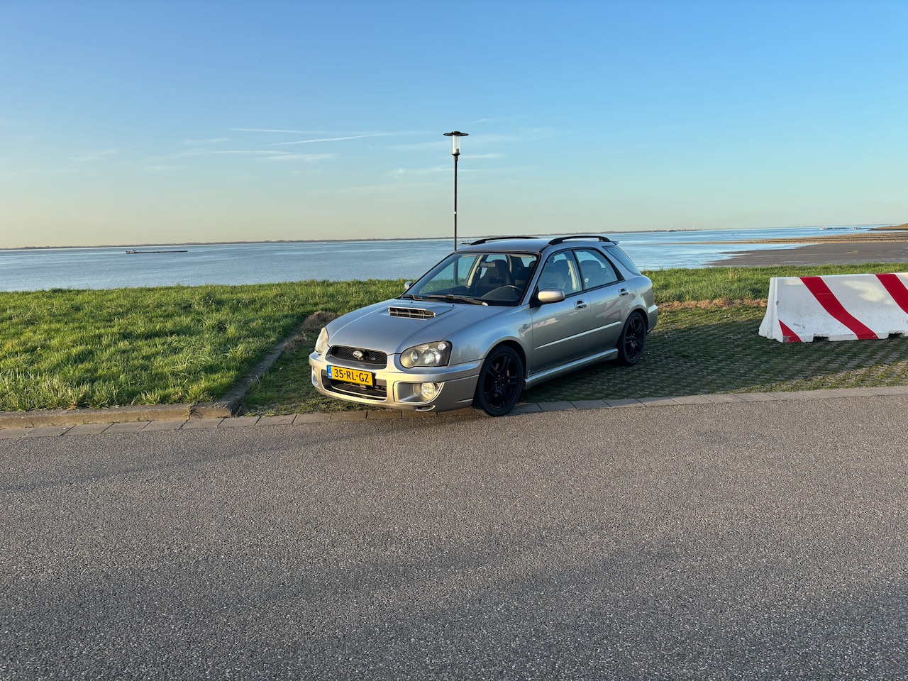 Subaru Impreza Plus - 2.0 WRX AWD - AutoWereld.nl