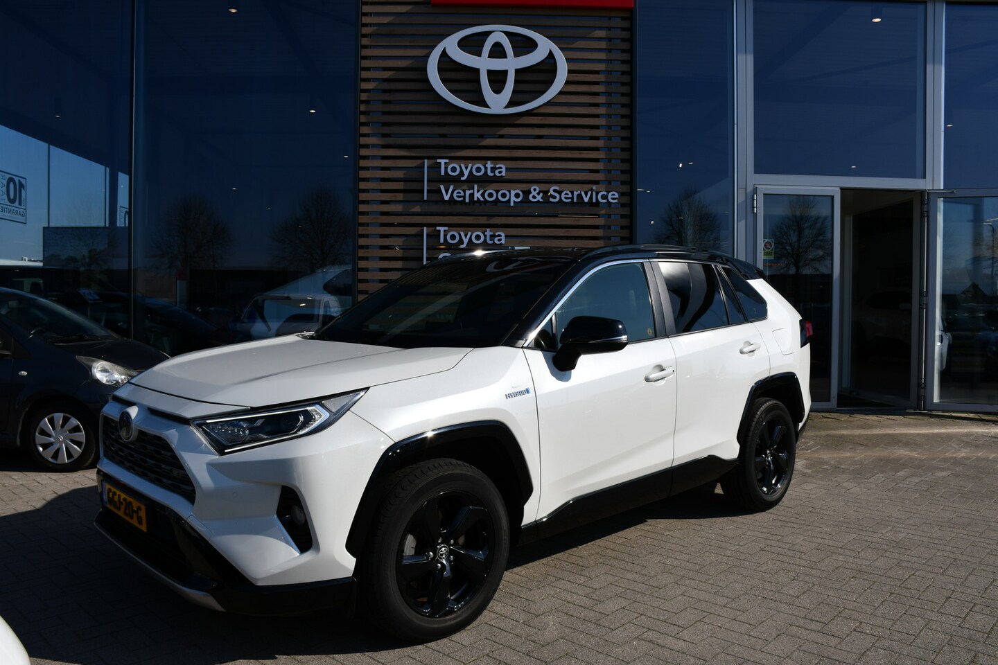 Toyota RAV4 - 2.5 Hybrid AWD Bi-Tone Limited Automaat 222pk | BearLock | Trekhaak | Cruise Control | - AutoWereld.nl