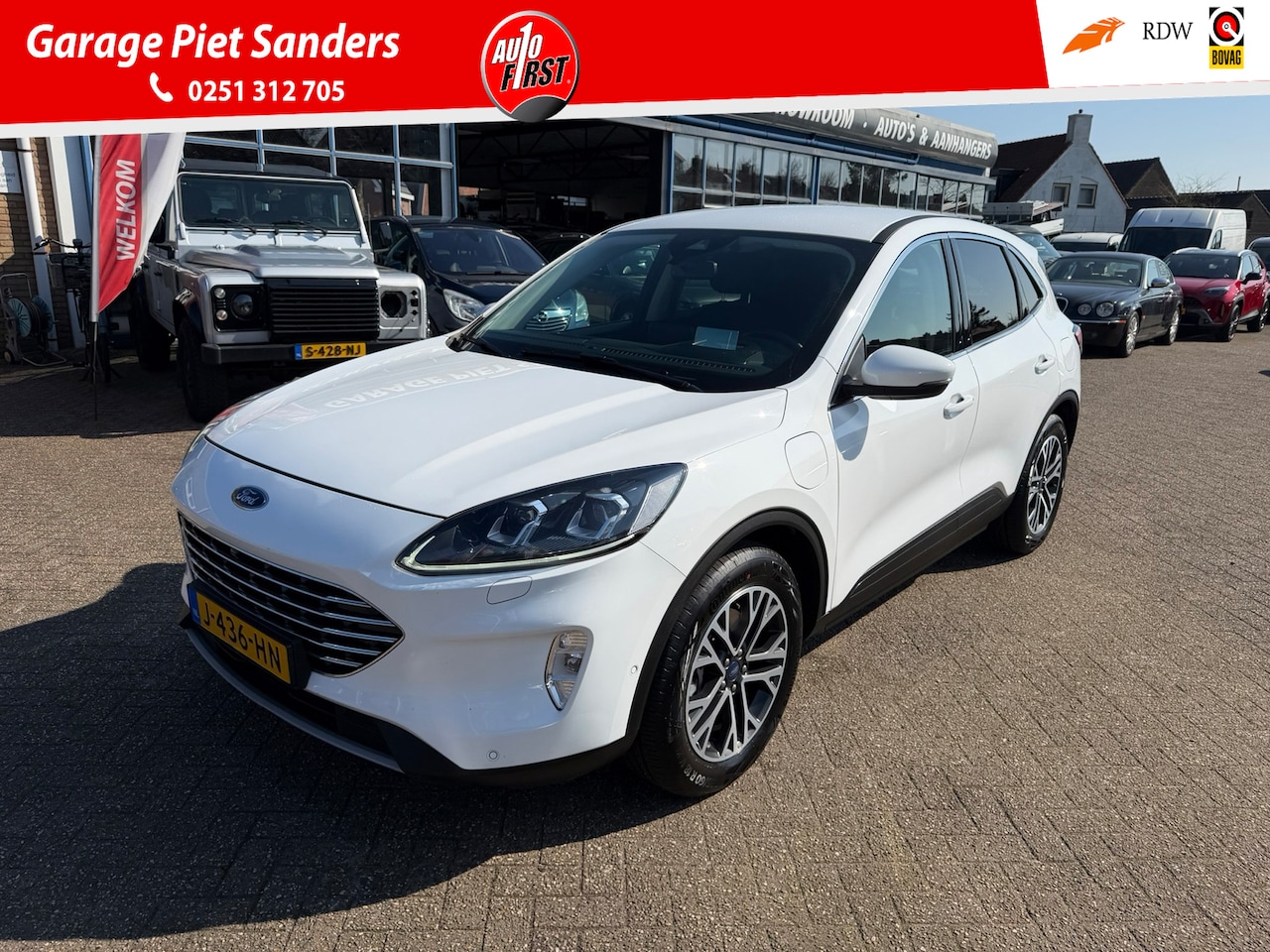 Ford Kuga - 2.5 PHEV Titanium X I Stoel/Stuur verw. I HUD I Elec. achterklep I 1e Eigenaar I - AutoWereld.nl