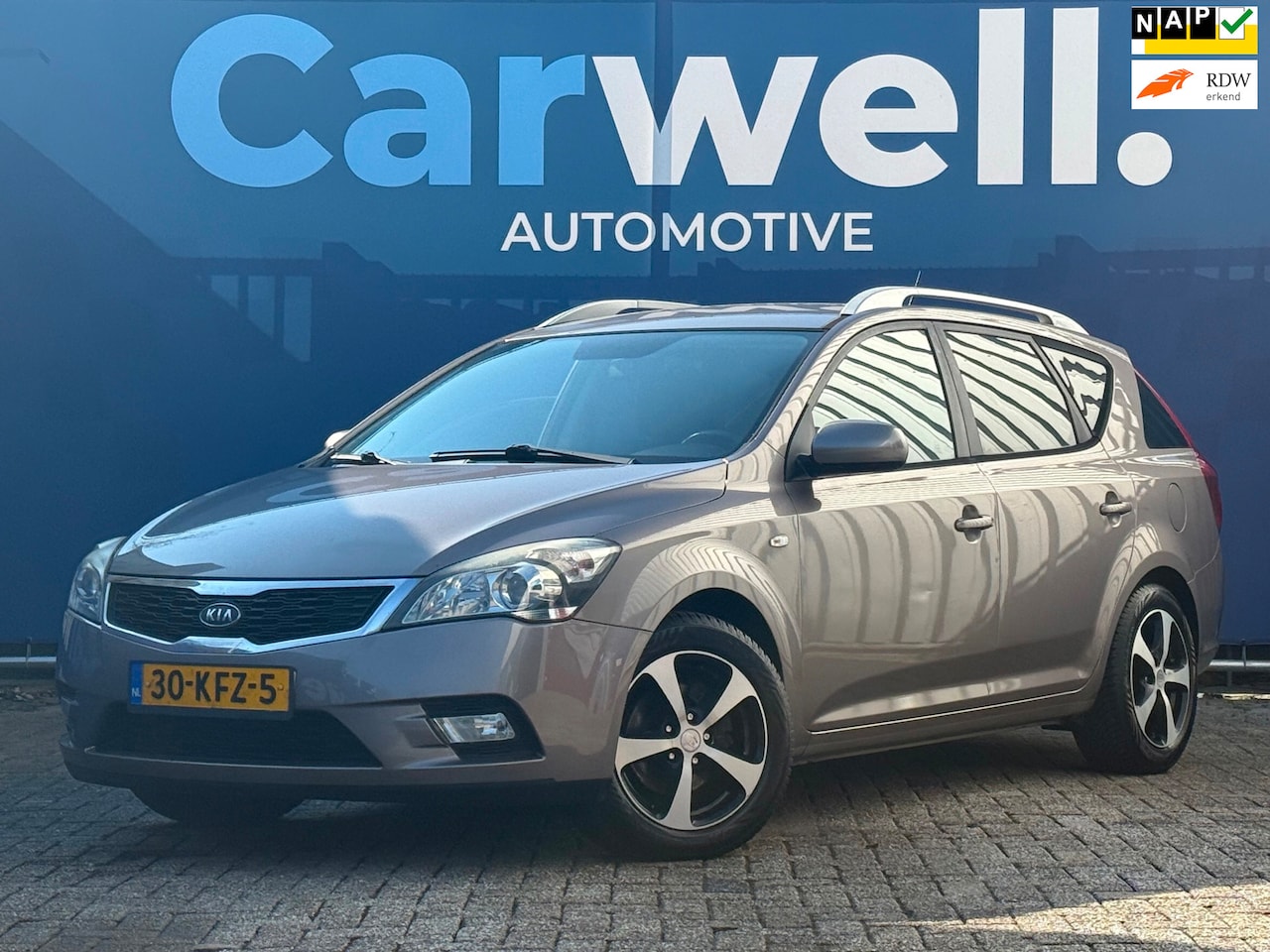 Kia Cee'd Sporty Wagon - 1.4 CVVT X-ecutive Trekhaak,Climate,ElektrischeRamen,LMV,N.A.P! - AutoWereld.nl