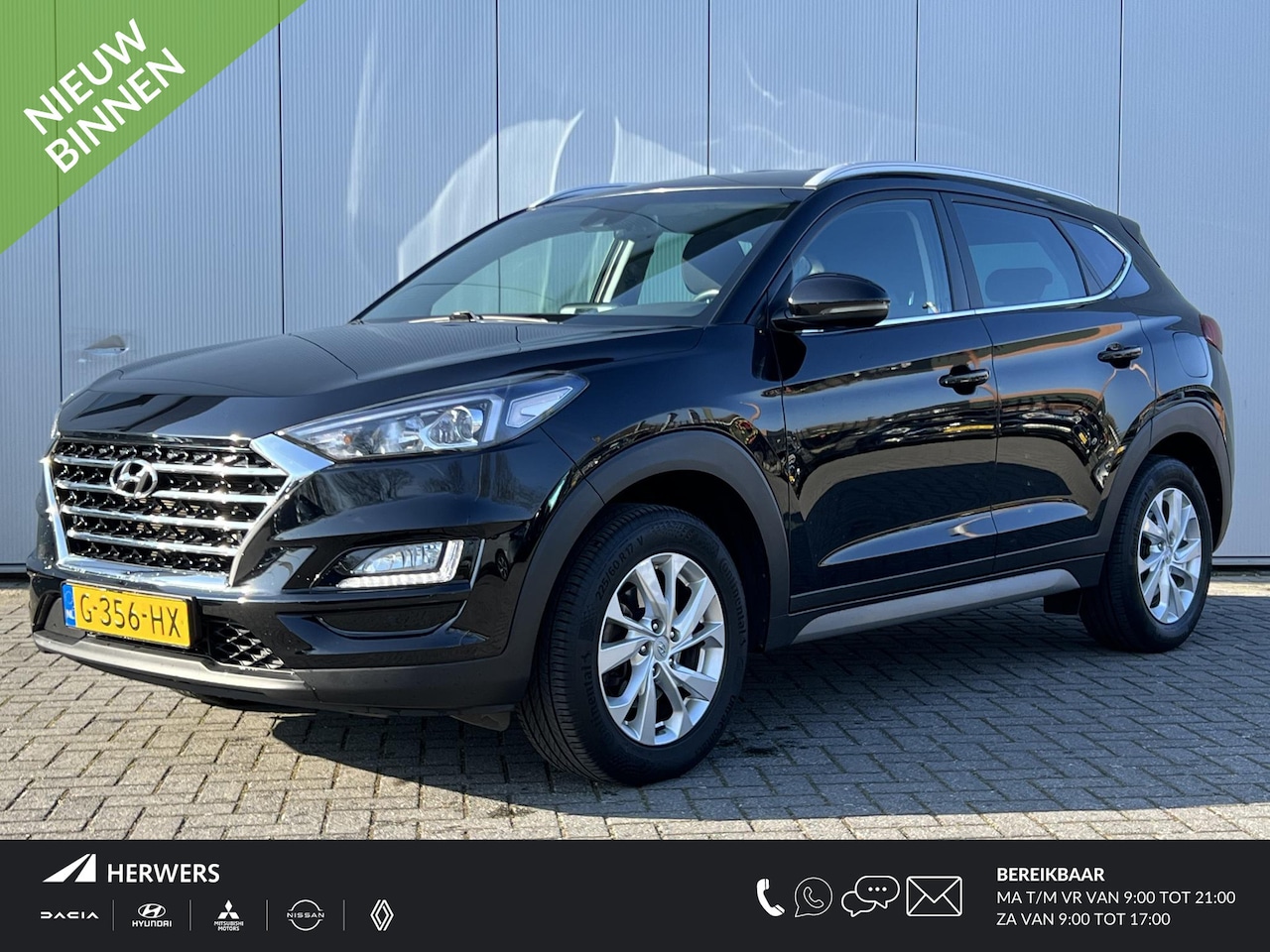 Hyundai Tucson - 1.6 GDI Comfort / Trekhaak 1400 kg / Navigatie / Stoel verwarming / Face lift / - AutoWereld.nl