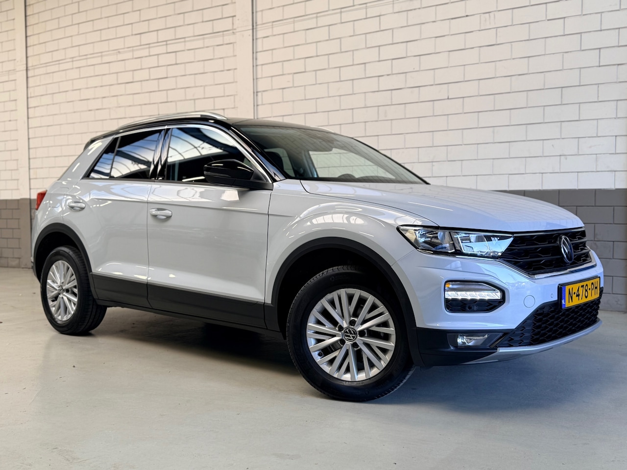Volkswagen T-Roc - 1.5 TSI DSG Style Business Two Tone - AutoWereld.nl