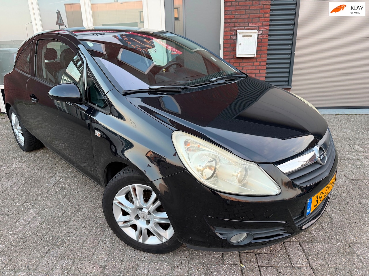 Opel Corsa - 1.2-16V Cosmo / Airco / PDC / Leder / NAP / LM - AutoWereld.nl