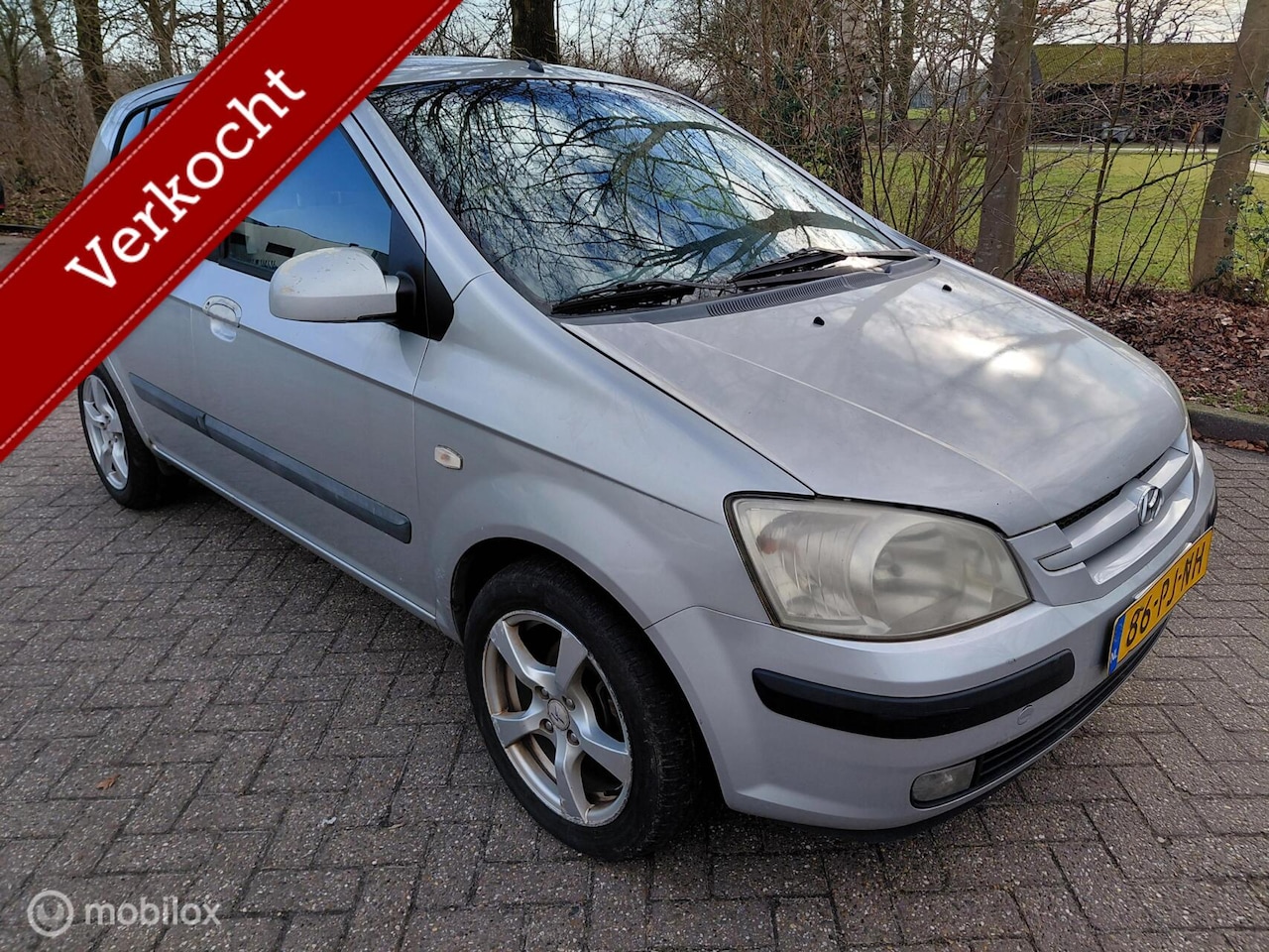Hyundai Getz - 1.3i 60 KW 82 PK GLS Sky Airco KM 186852 NAP - AutoWereld.nl