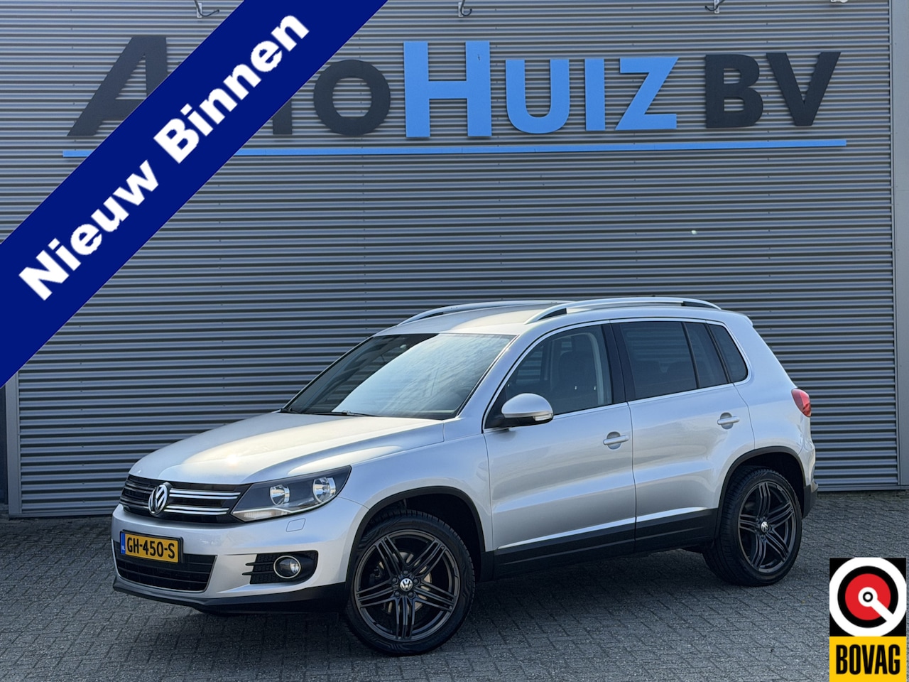 Volkswagen Tiguan - 2.0 TSI Sport&Style 4Motion PDC Trekhaak Cruise Control Leder Navigatie Stoelverwarming - AutoWereld.nl