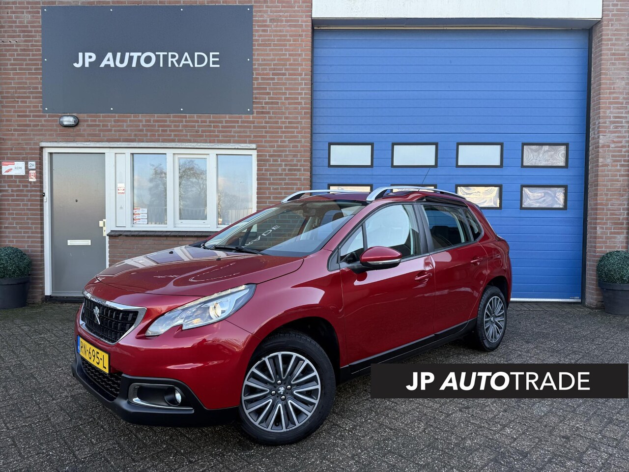 Peugeot 2008 - 1.2 PureTech Blue Lion | Aut. | Nav | Trekhaak - AutoWereld.nl