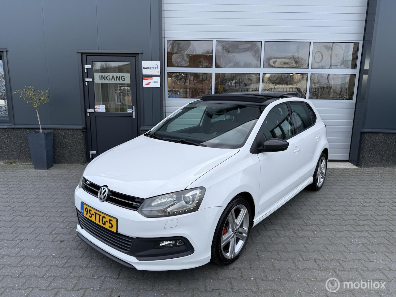 Volkswagen Polo - 1.2 TSI Highline / Pano / Trekhaak / DSG - AutoWereld.nl