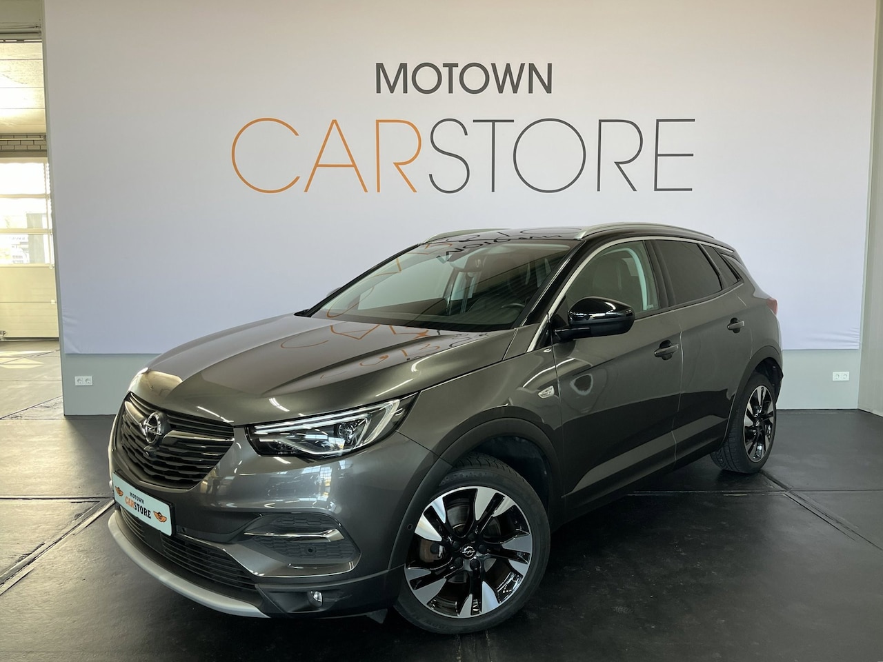 Opel Grandland X - 1.2 Turbo Ultimate Leder Navi Camera Carplay Pdc - AutoWereld.nl