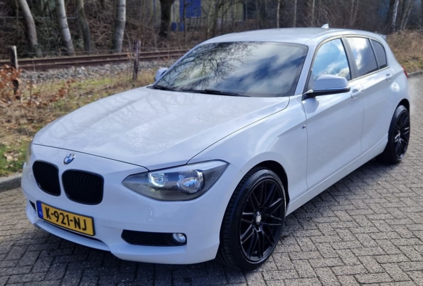 BMW 1-serie - 116i Business 191D KM Navi - AutoWereld.nl