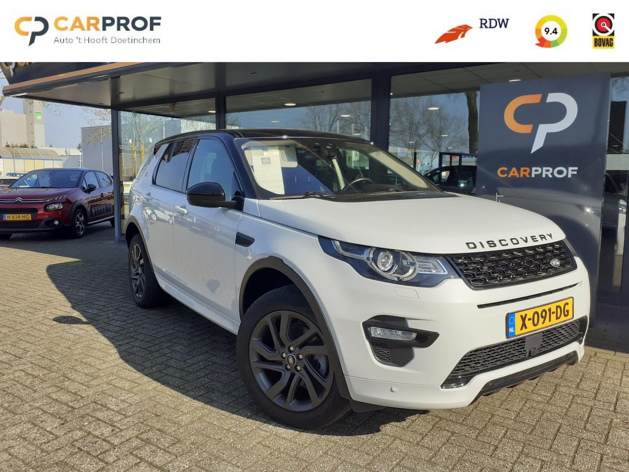 Land Rover Discovery Sport - 2.0 Si4 Anniversary 4x4 / Panorama dak/verwarmde voorstoelen en achterbank - AutoWereld.nl