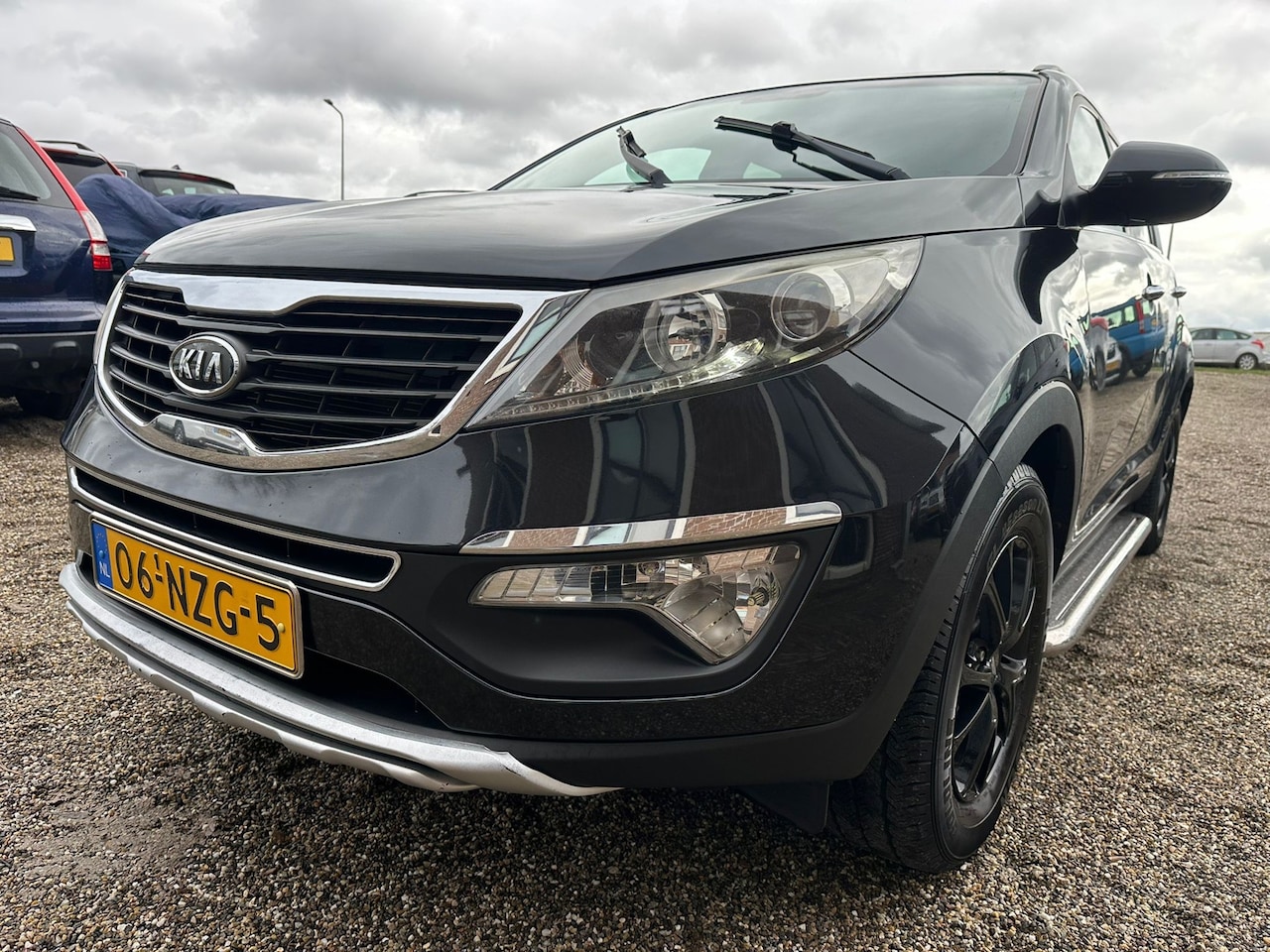 Kia Sportage - 1.6 GDI ISG X-ecutive Plus Pack Pano Cruise Camera Navi Leer TV - AutoWereld.nl