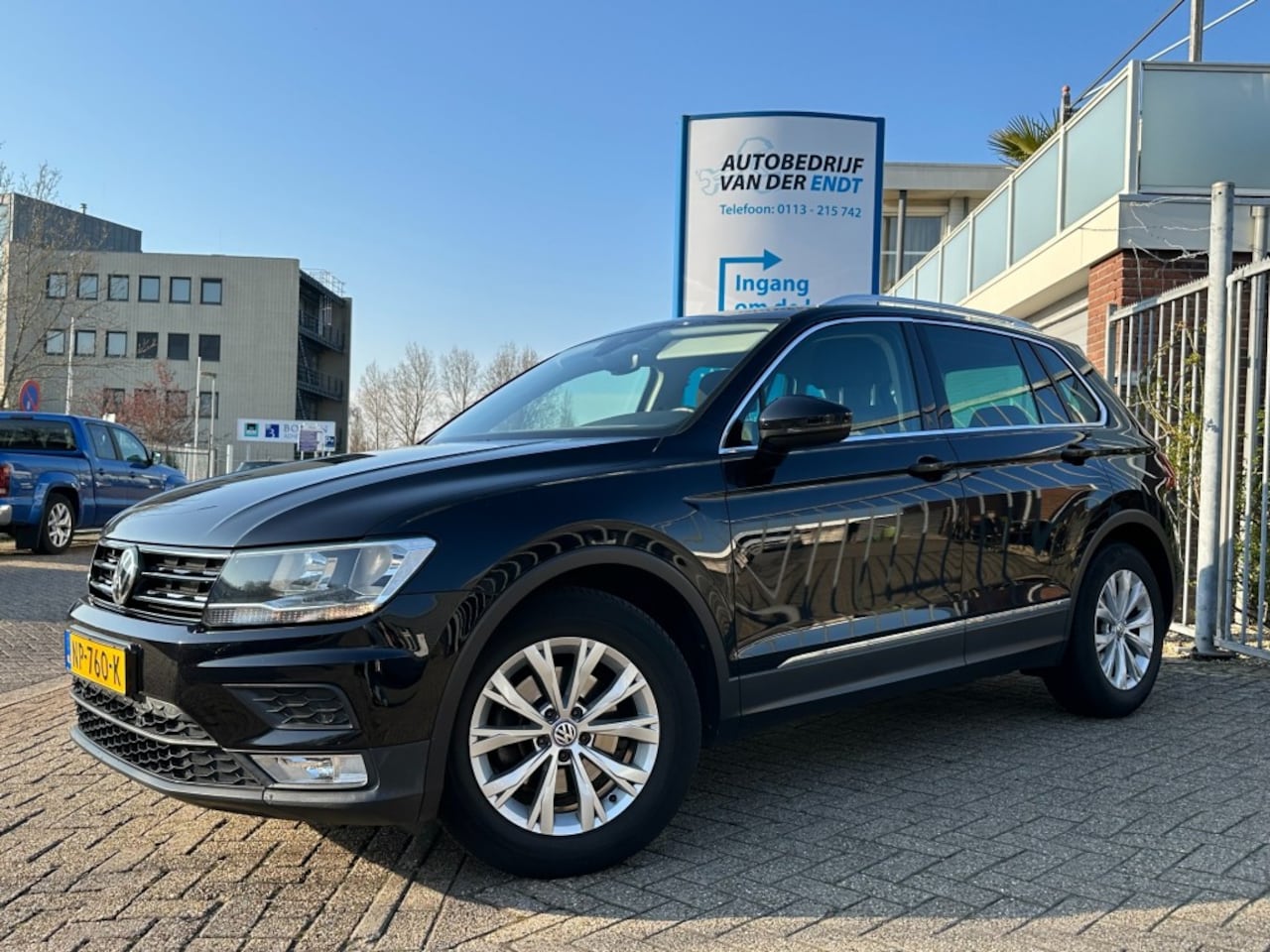 Volkswagen Tiguan - 1.4 TSI 150PK ACT Comfortline  Trekhaak 1800kg  PDC  DAB+  NAVI - AutoWereld.nl