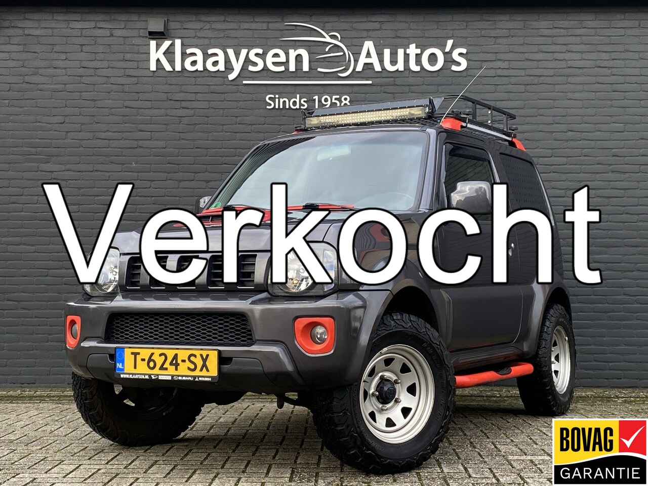 Suzuki Jimny - 1.3 4WD Exclusive | leder interieur | airco | trekhaak | stoelverwarming | imperiaal | ele - AutoWereld.nl
