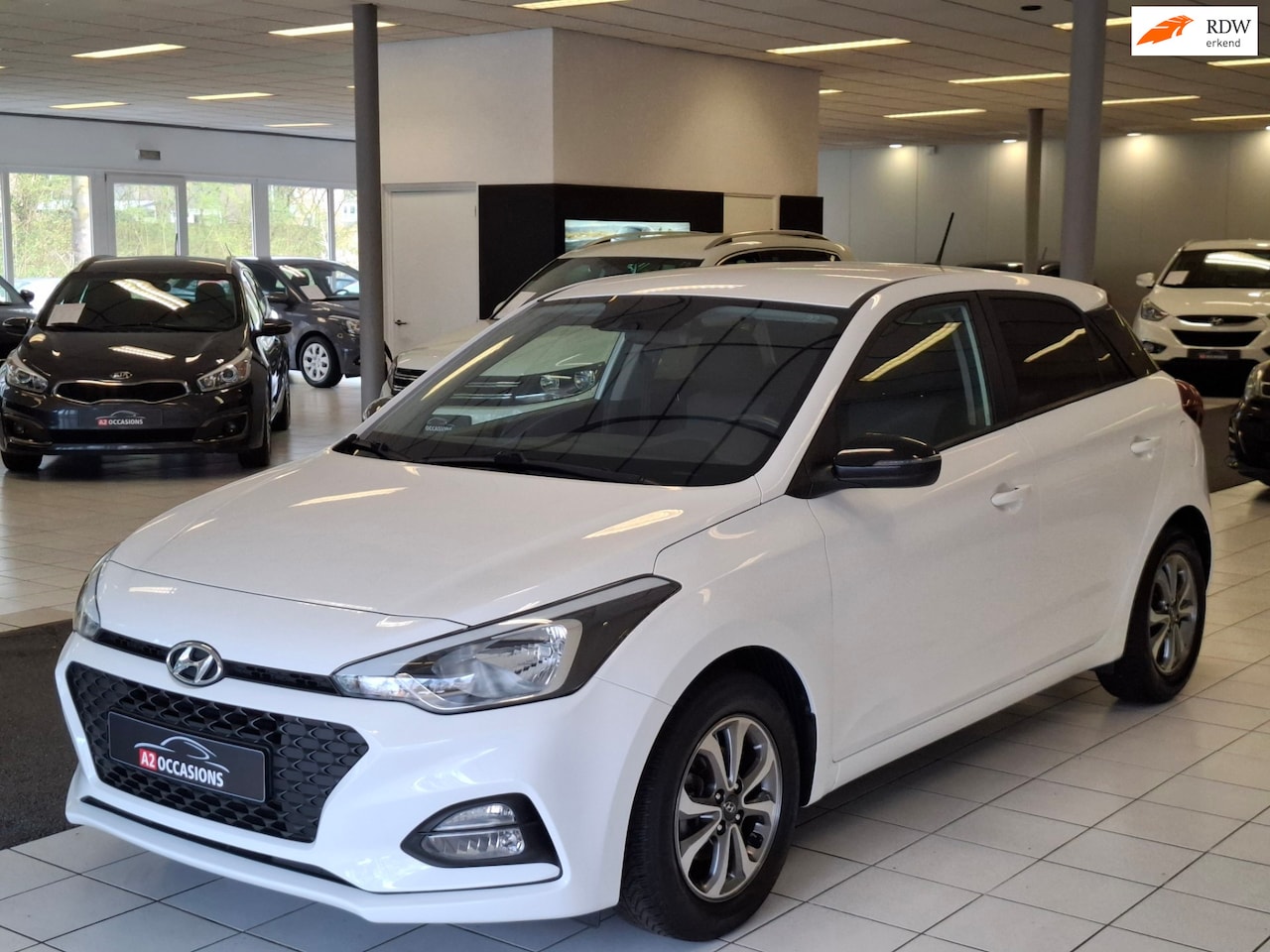 Hyundai i20 - 1.2 (4 Cil) Apple carplay/Android auto/Cruise/Camera/DAB/Bluetooth/Stoel en stuurverwarmin - AutoWereld.nl