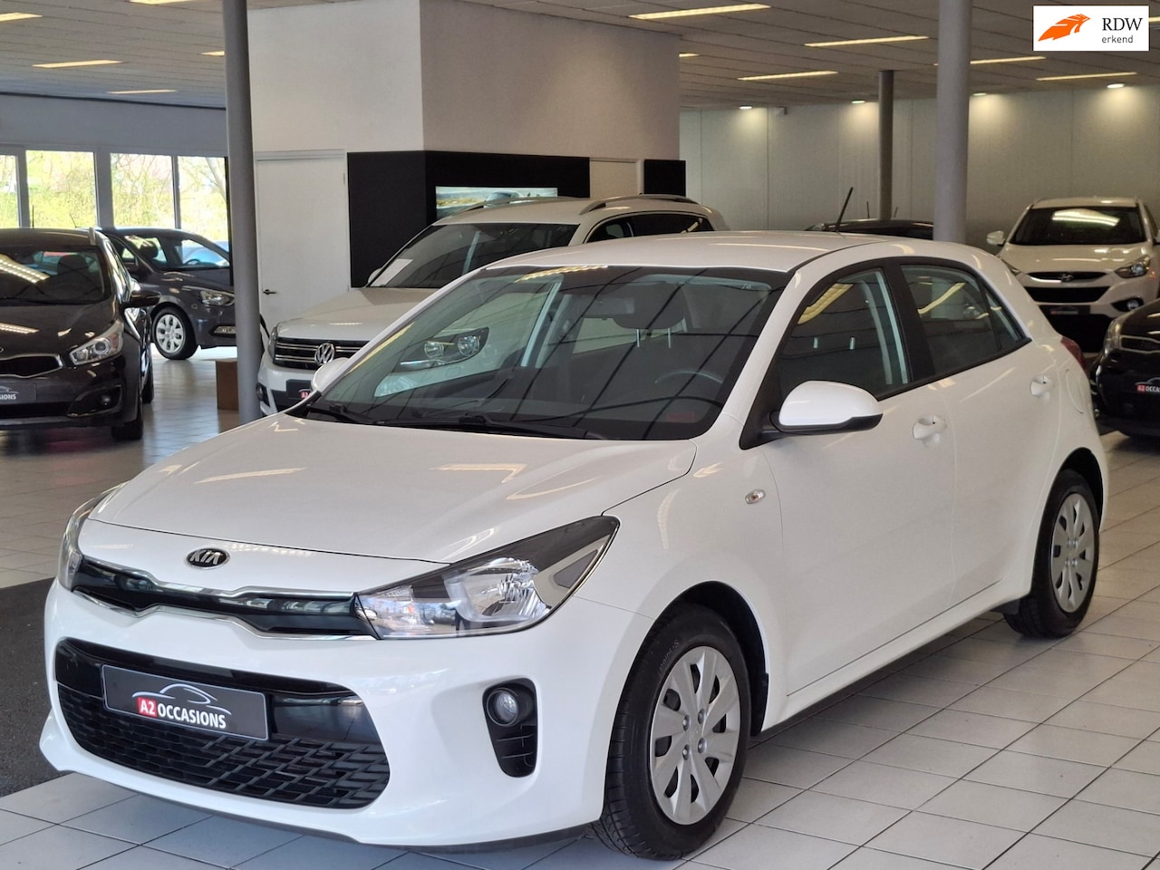 Kia Rio - 1.2(4 cil) Bluetooth/PDC/Cruise/Stoel+Stuuverw/All Season - AutoWereld.nl