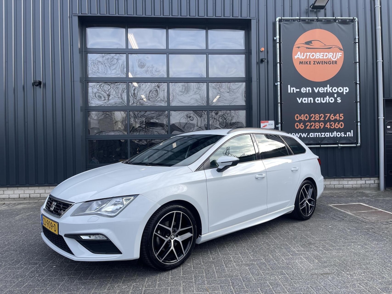 SEAT Leon ST - 1.5 TSI FR AUT. CARPLAY|TREKHAAK|KEYLESS|SFEERVERLICHTING|STOELVERWARMING|NAVIGATIE|CRUISE - AutoWereld.nl