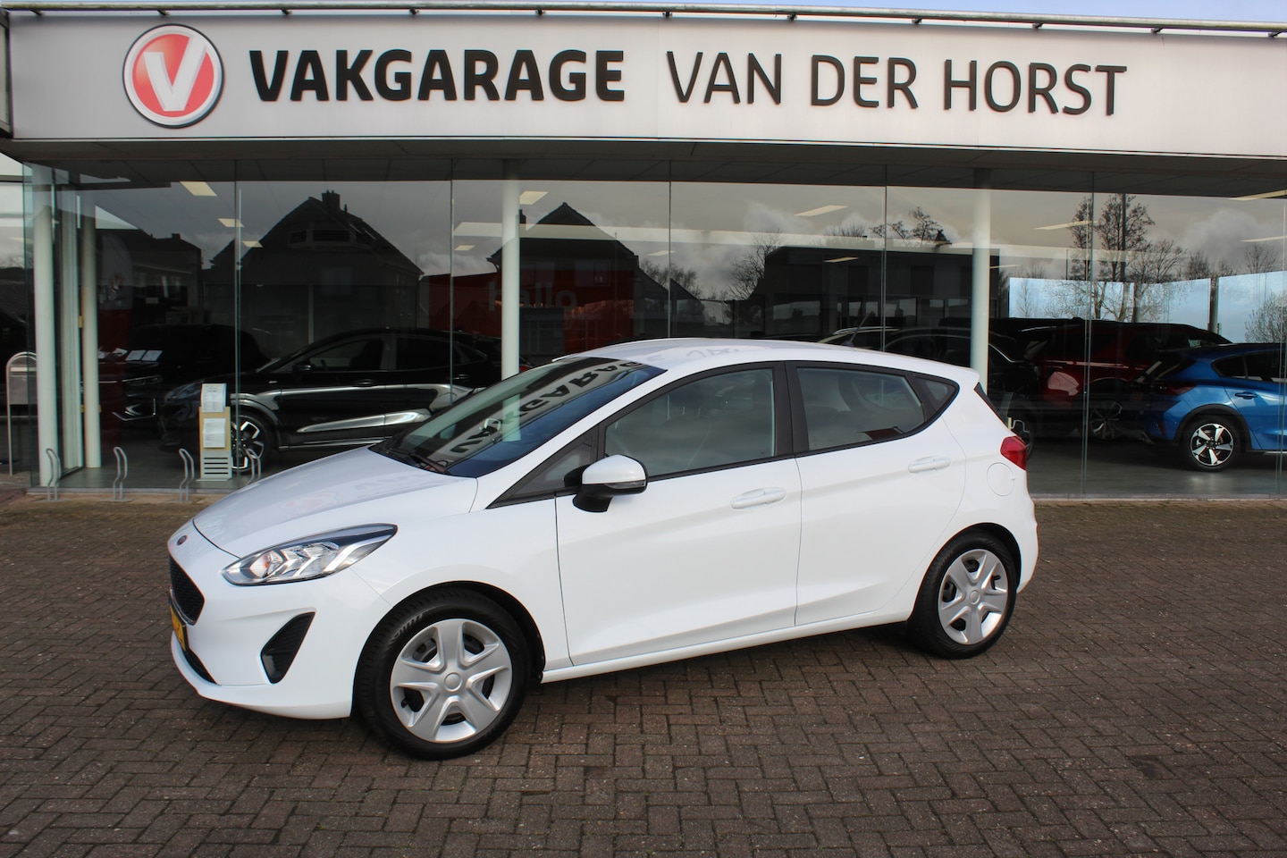 Ford Fiesta - 1.1-71pk Trend 5drs. Erg nette Ford Fiesta voor nog jaren rijplezier ! Airco, parkeersenso - AutoWereld.nl