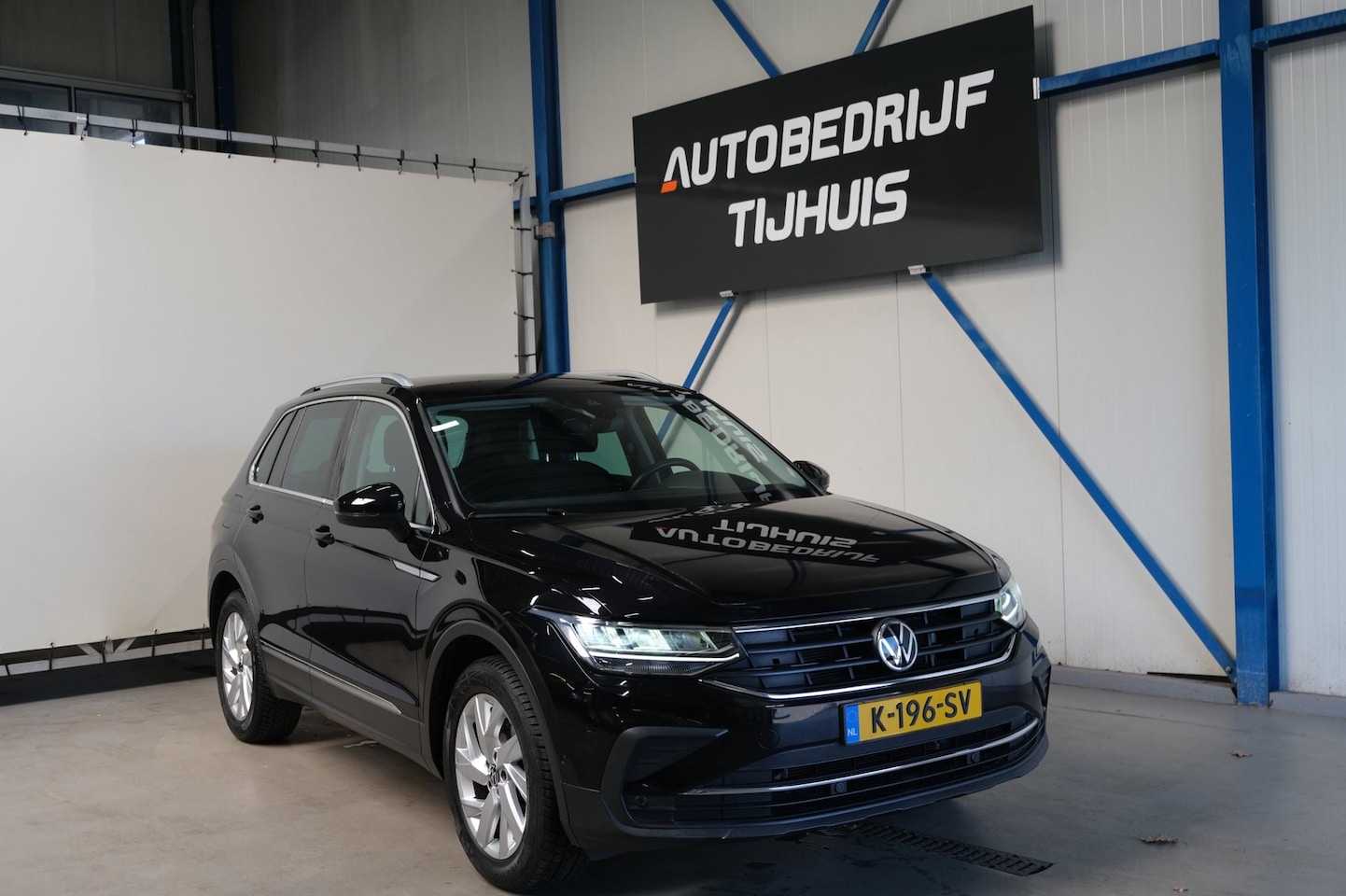 Volkswagen Tiguan - 1.5 TSI Life Business - N.A.P. Airco, Cruise, Navi, PDC, Camera, Virtual Display, Trekhaak - AutoWereld.nl