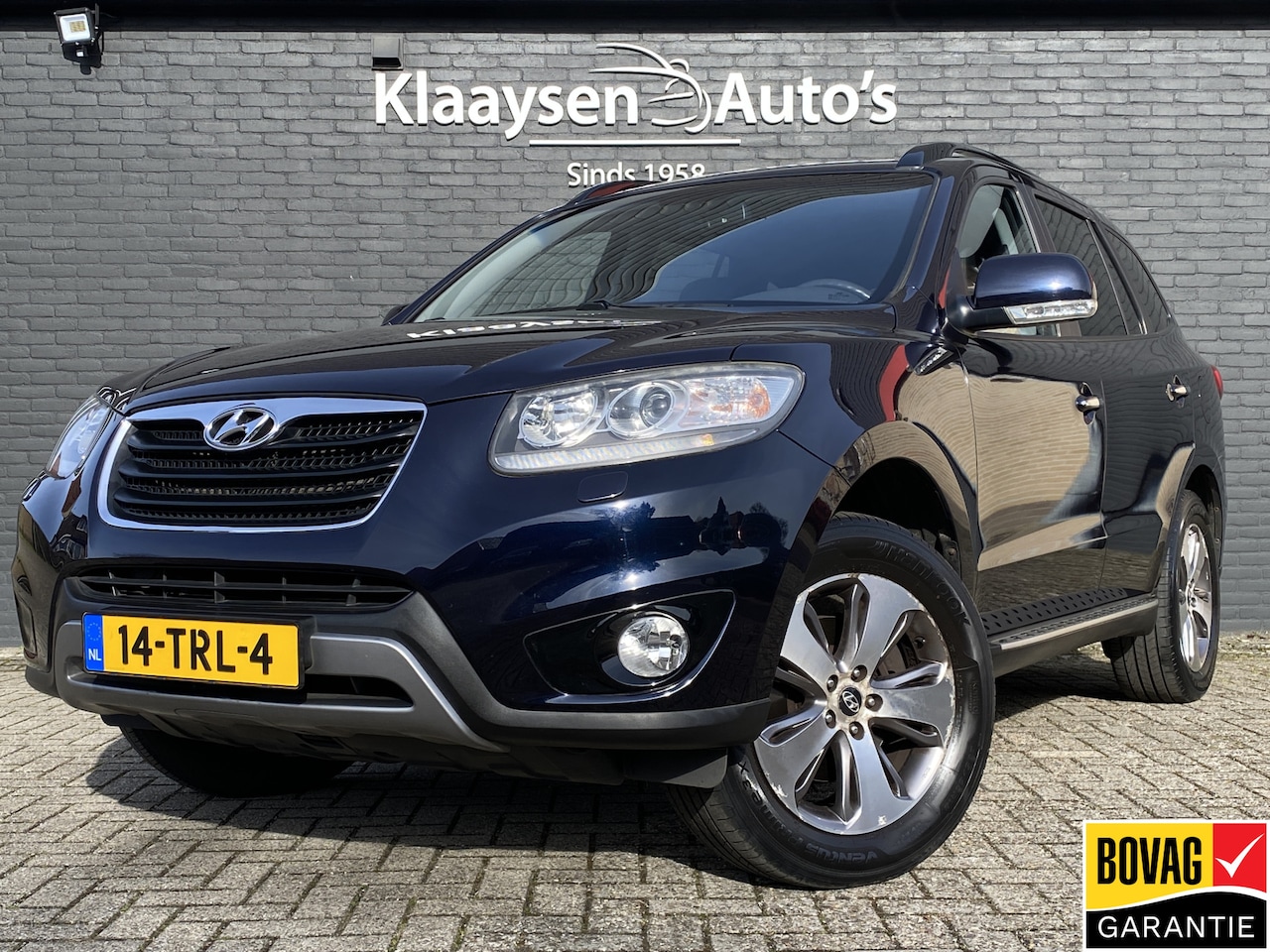 Hyundai Santa Fe - 2.4i CVVT 175 pk 4WD Style AUT. | dealer onderhouden | navigatie | leder interieur | elekt - AutoWereld.nl