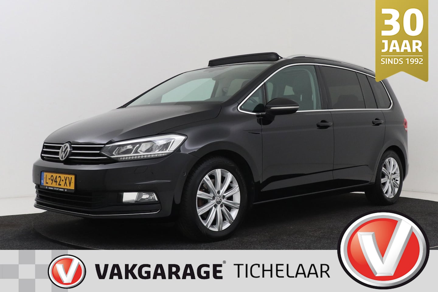 Volkswagen Touran - 1.4 TSI Highline Business 7p | Trekhaak | Panoramadak | Camera | Navigatie | Stoelverwarmi - AutoWereld.nl