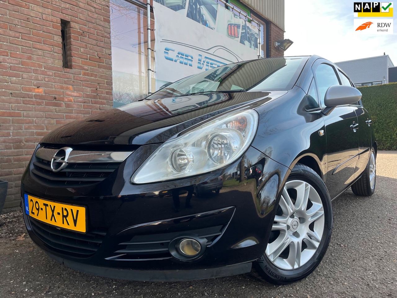 Opel Corsa - 1.4-16V Cosmo|Airco|Cruise|5-drs|Half-leder| - AutoWereld.nl