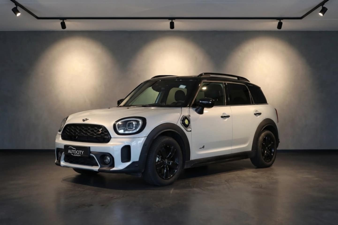 MINI Countryman - Cooper SE NORTHWOOD Untamed Edition All4 Pano l Camera l Leder l - AutoWereld.nl