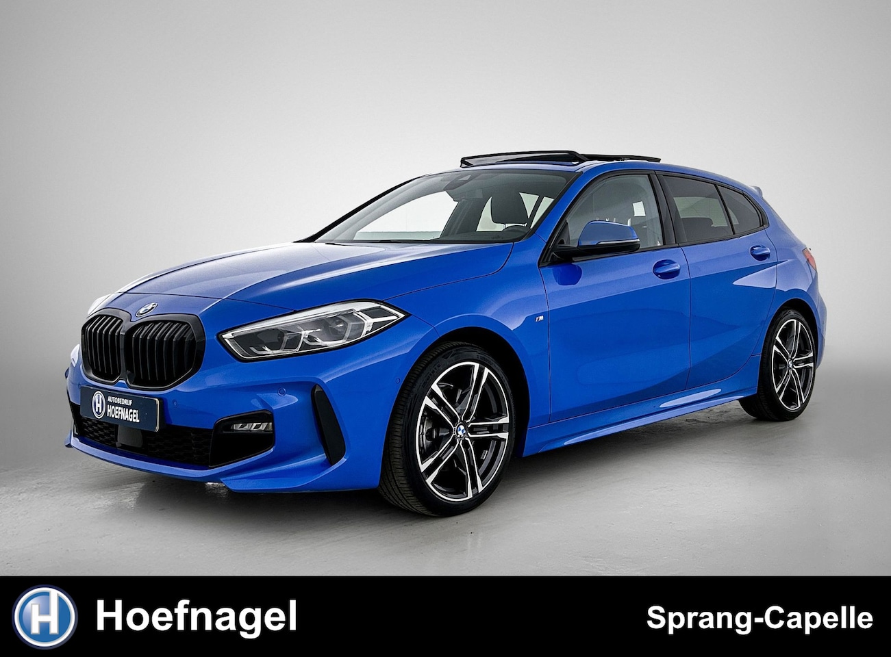 BMW 1-serie - 118i M Sport | Schuifdak | Stoelverwarming | Camera | Cruise Control | Leder - AutoWereld.nl
