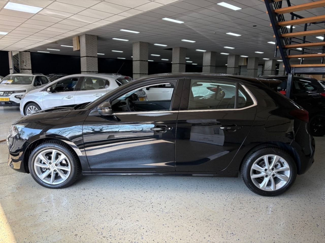 Opel Corsa - 1.2 T Automaat Winterpakket Navigatie app Airco PDC Leder Half - AutoWereld.nl