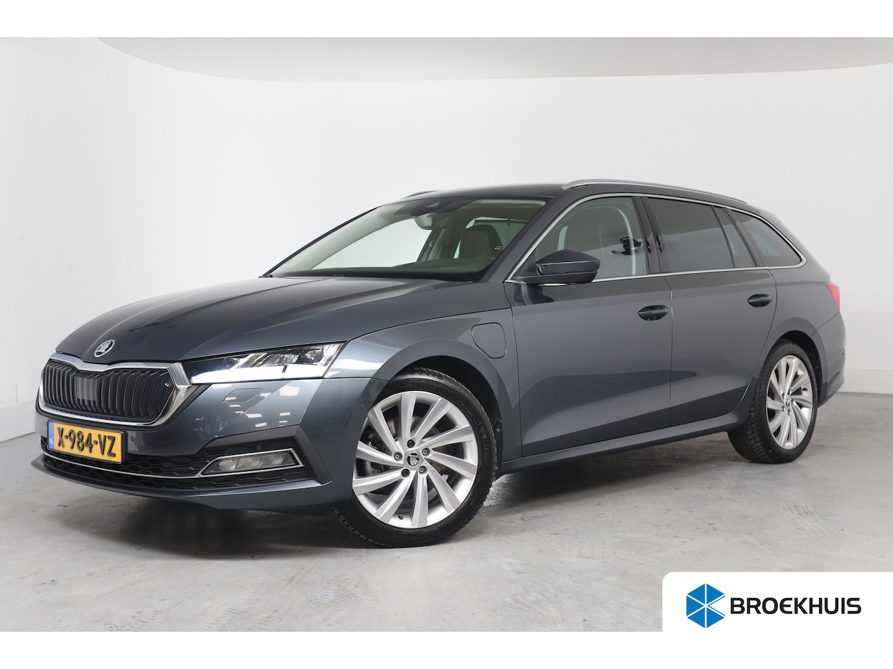 Skoda Octavia Combi - 1.4 TSI iV PHEV Business Edition Plus Navigatie | Memory stoelen | Adaptieve Cruise | Stoe - AutoWereld.nl