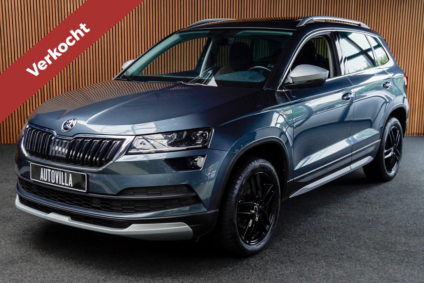 Skoda Karoq - 1.5 TSI ACT Panodak Navi Virtual Stoelverwarming Cruise PDC LM velgen - AutoWereld.nl