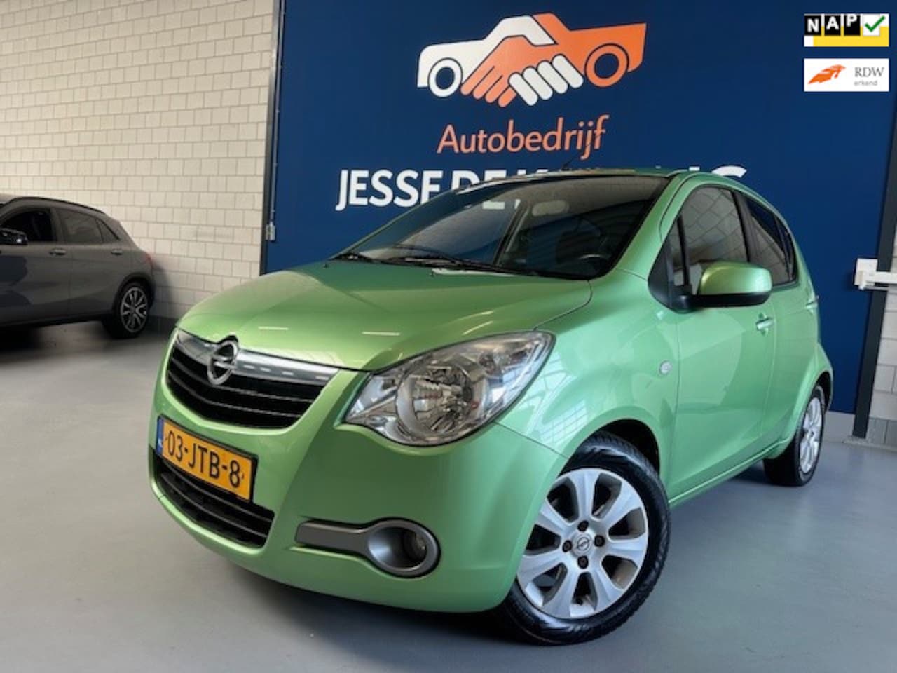 Opel Agila - 1.2 Enjoy / bj.2009 / kleur: groen / airco / NAP met 79969 km./ APK tot 03/2027 / 1e eigen - AutoWereld.nl